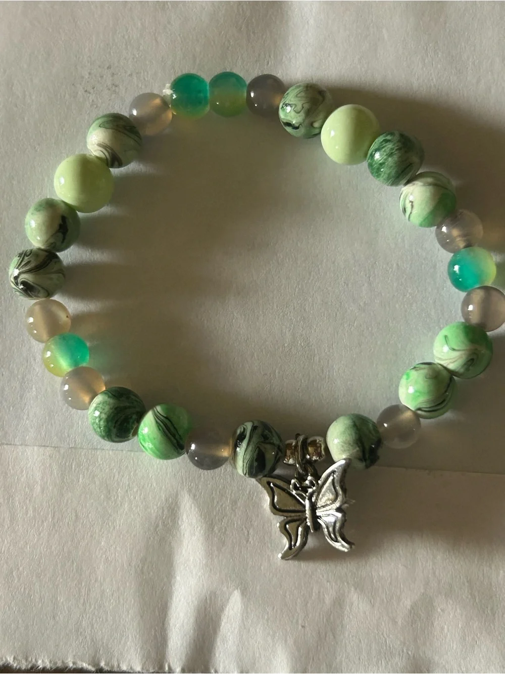 2 bracelets Light Green Beaded Bracelet with Iridescent Butterfly Charm